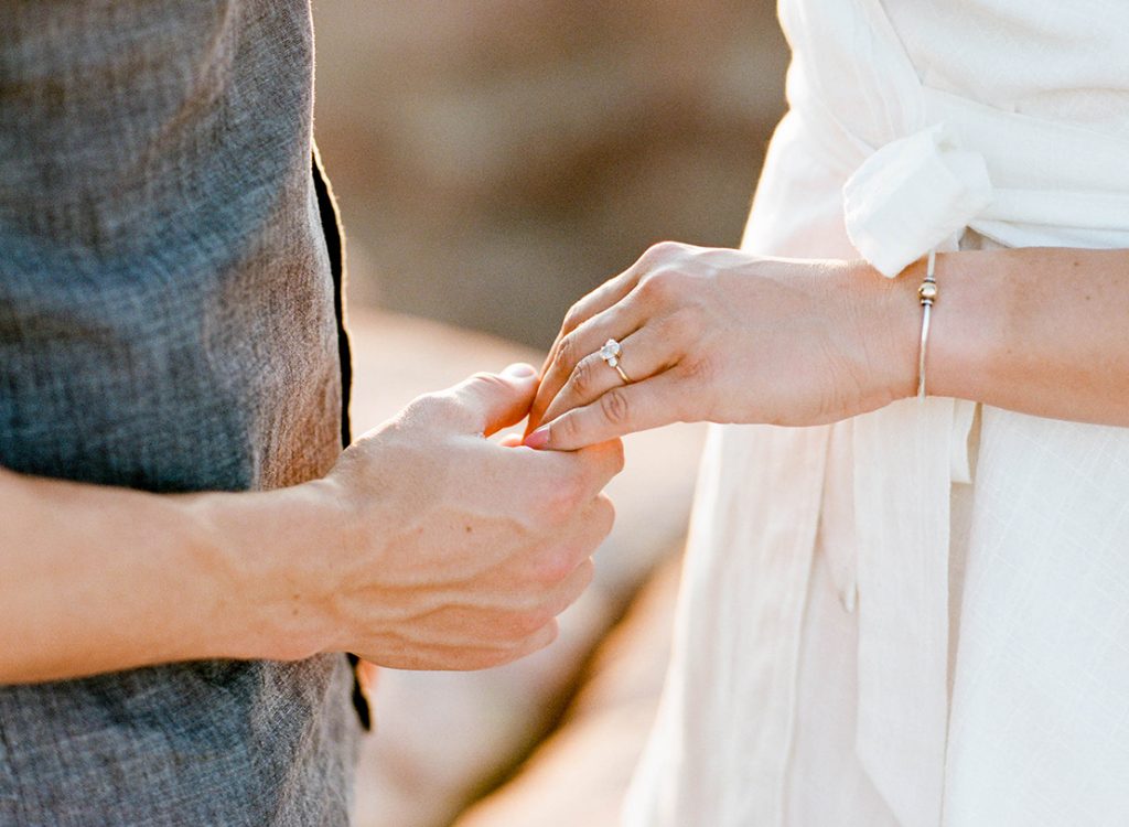 hands with engagement ring Utah Engagement Session Dead Horse Point State Moab 